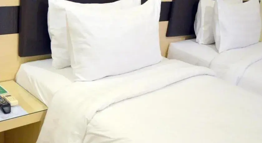 Bed in Sumi Hotel Mangga Besar Bed in Sumi Hotel Mangga Besar