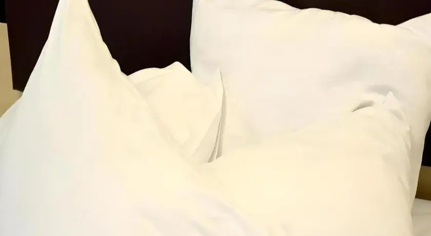 Bed in Sumi Hotel Mangga Besar Bed in Sumi Hotel Mangga Besar