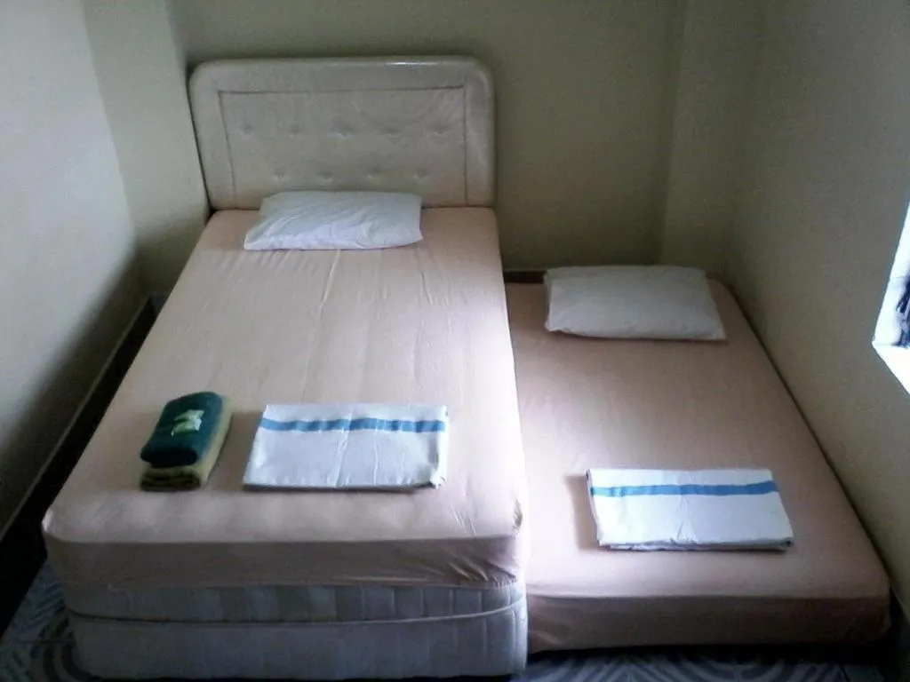 Bed in Hotel Sinar Khatulistiwa