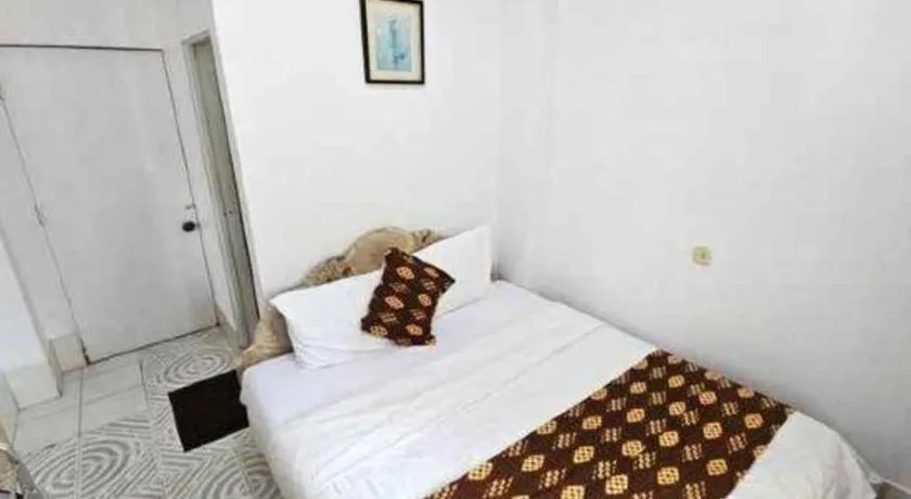 Bed in Hotel Sinar Khatulistiwa