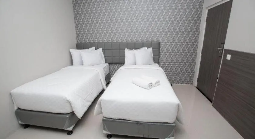 Bed in Smart Budget Hotel