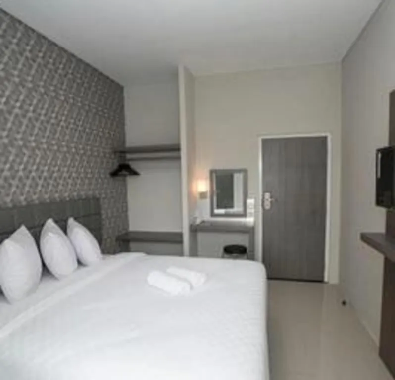 Bed in Smart Budget Hotel