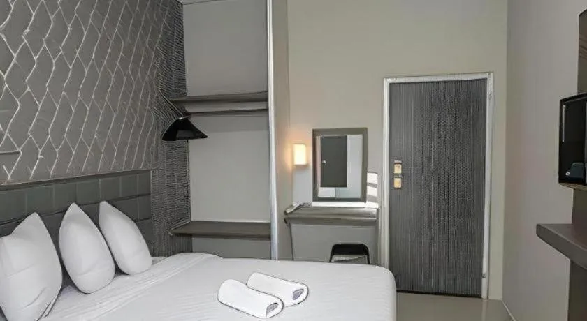 Bed in Smart Budget Hotel