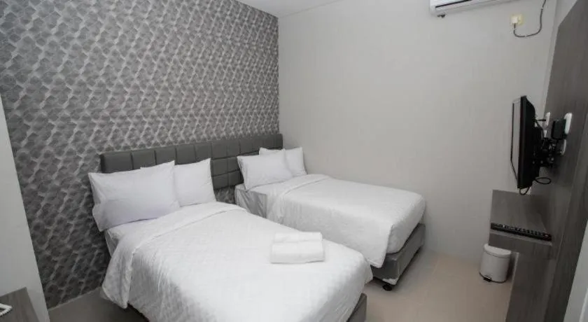 Bed in Smart Budget Hotel