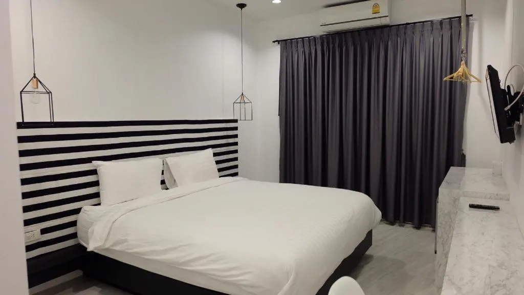 Bed in Chic-Chidkong Boutique Hotel