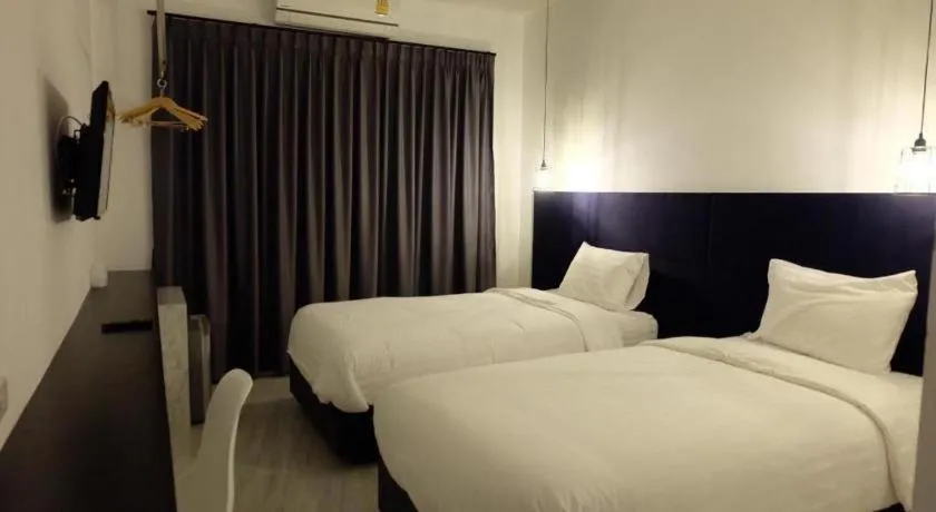 Bed in Chic-Chidkong Boutique Hotel