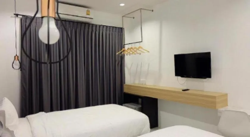 Bed in Chic-Chidkong Boutique Hotel
