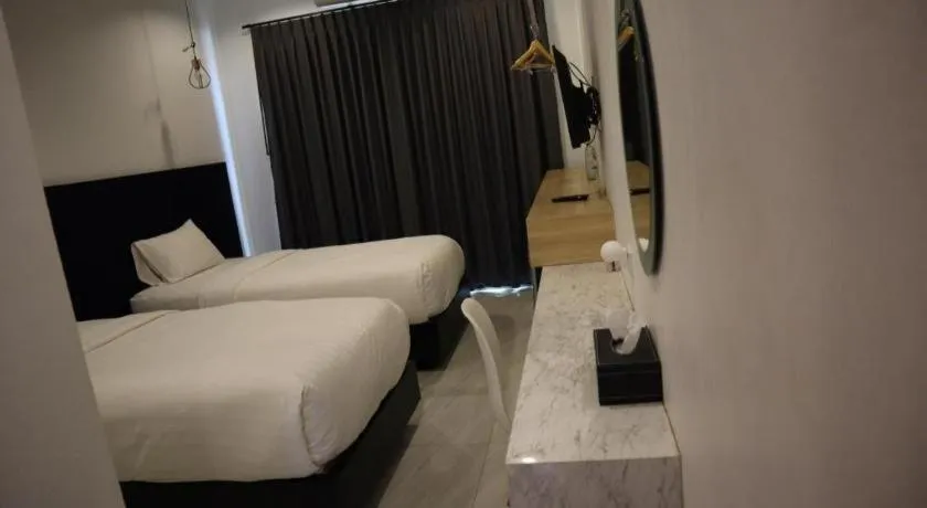 Bed in Chic-Chidkong Boutique Hotel