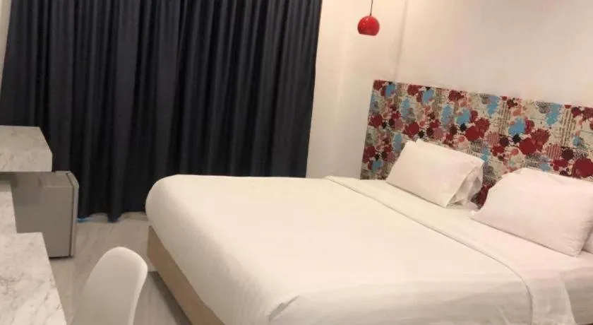 Bed in Chic-Chidkong Boutique Hotel