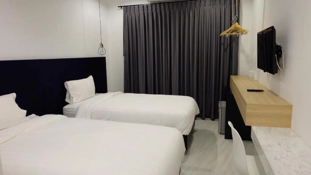 Bed in Chic-Chidkong Boutique Hotel