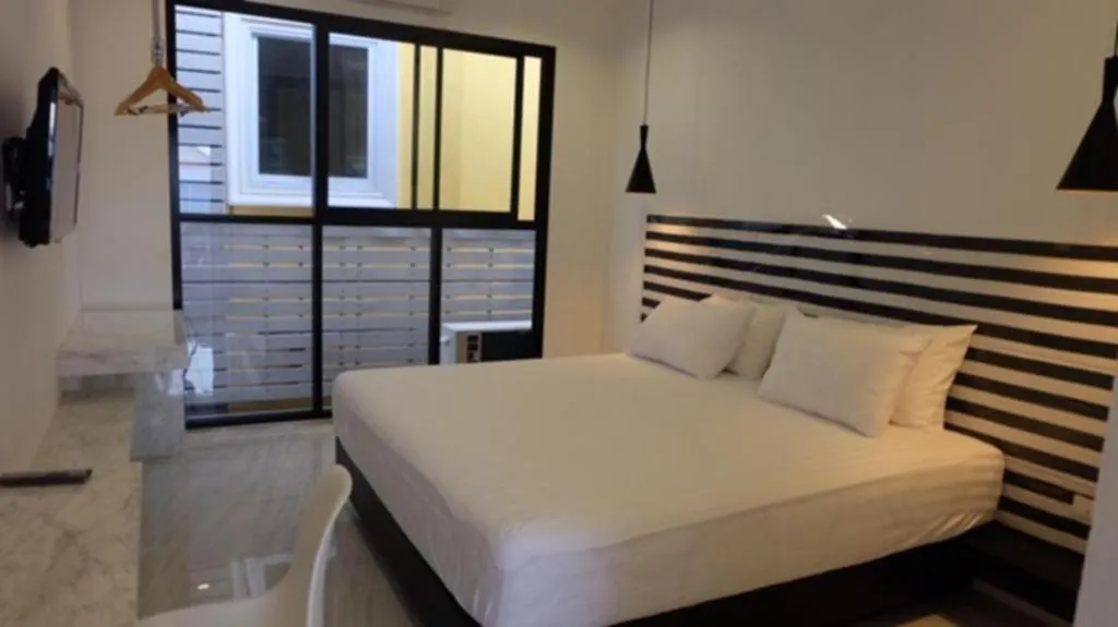 Bed in Chic-Chidkong Boutique Hotel