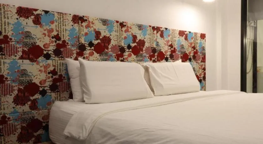 Bed in Chic-Chidkong Boutique Hotel