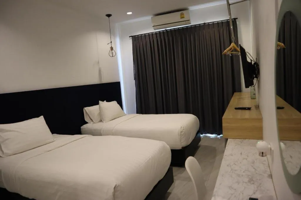 Bed in Chic-Chidkong Boutique Hotel