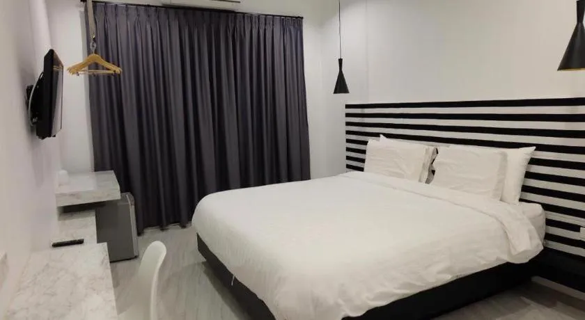 Bed in Chic-Chidkong Boutique Hotel