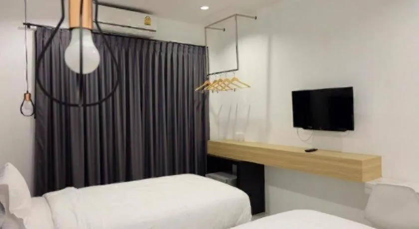 Bed in Chic-Chidkong Boutique Hotel