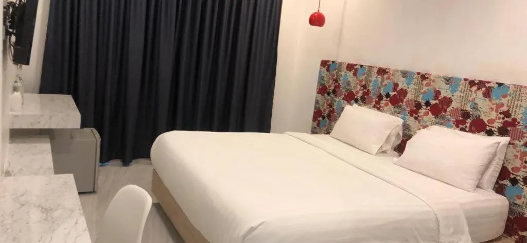 Bed in Chic-Chidkong Boutique Hotel