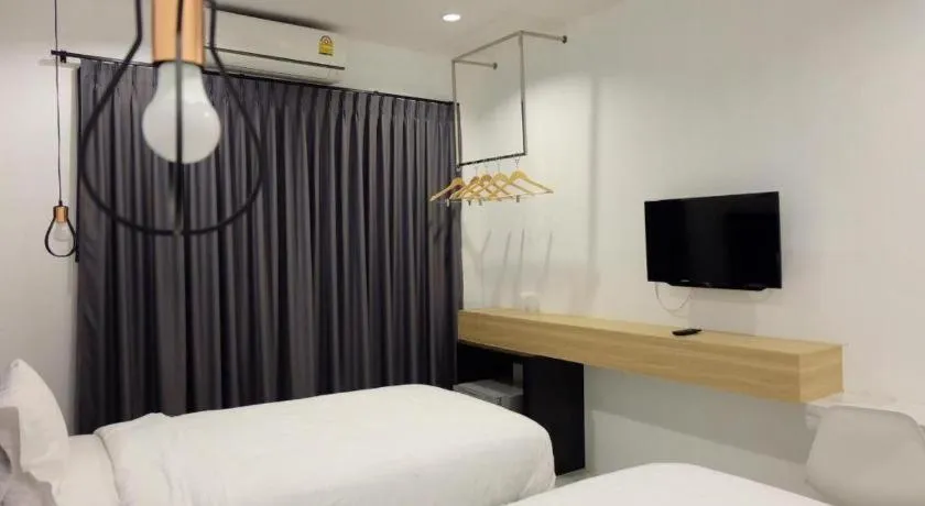 Bed in Chic-Chidkong Boutique Hotel