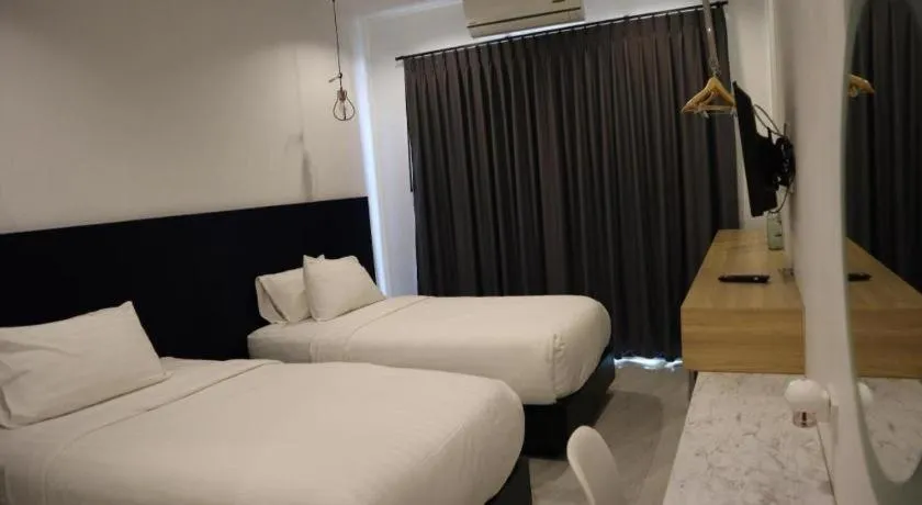 Bed in Chic-Chidkong Boutique Hotel