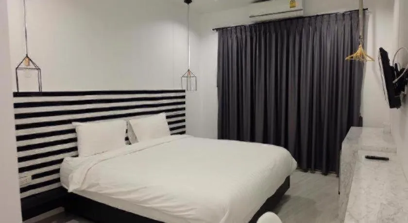 Bed in Chic-Chidkong Boutique Hotel