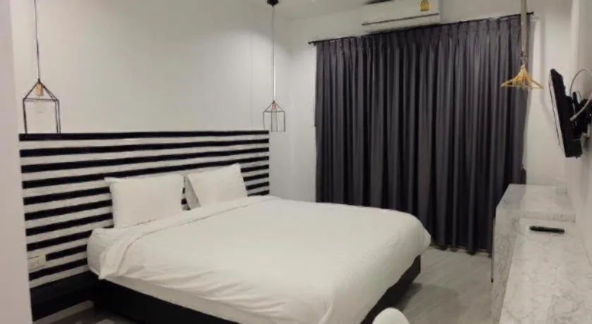 Bed in Chic-Chidkong Boutique Hotel