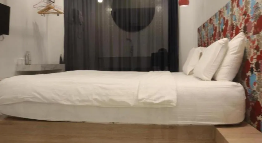 Bed in Chic-Chidkong Boutique Hotel