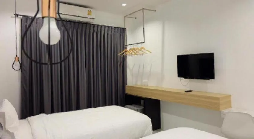 Bed in Chic-Chidkong Boutique Hotel