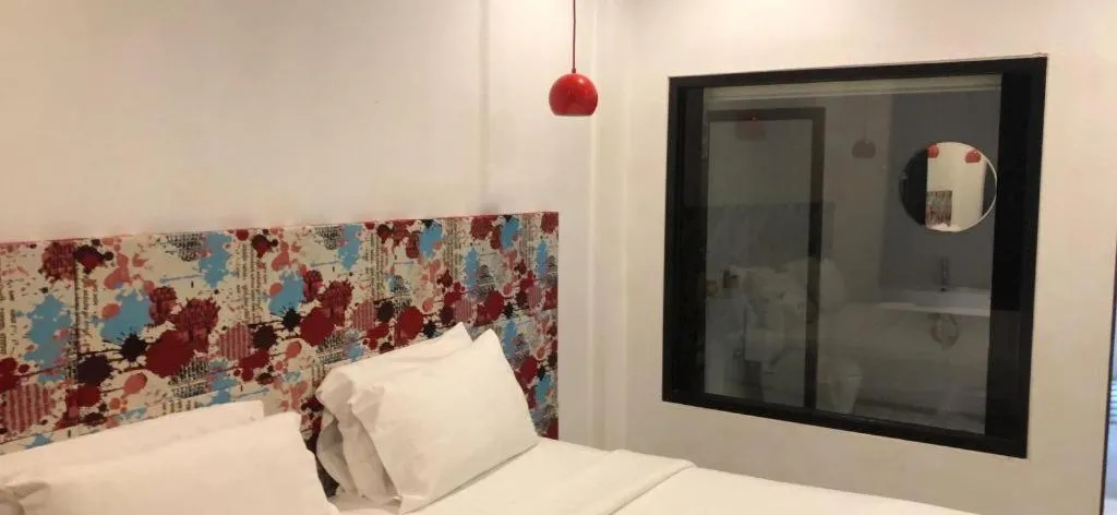 Bed in Chic-Chidkong Boutique Hotel