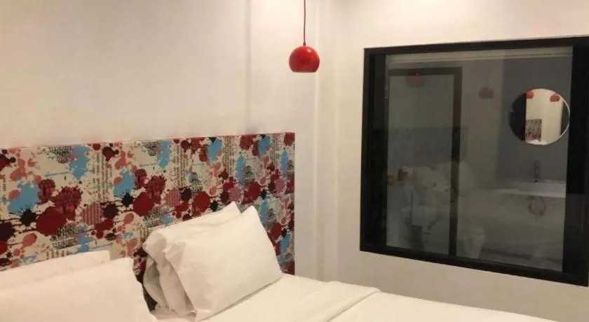Bed in Chic-Chidkong Boutique Hotel