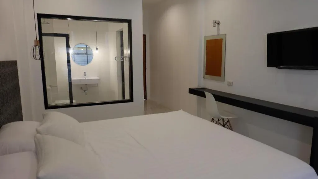 Bed in Chic-Chidkong Boutique Hotel