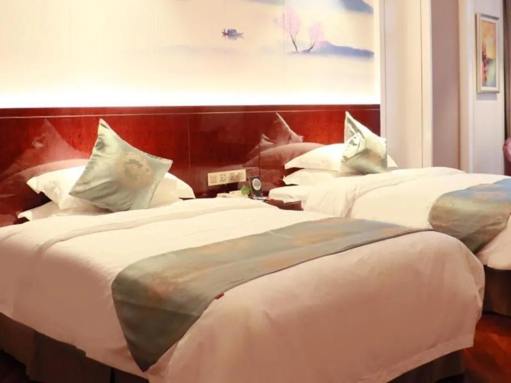 Bed in GreenTree Eastern Yancheng Binhai County Aobaolia Beichen Hotel