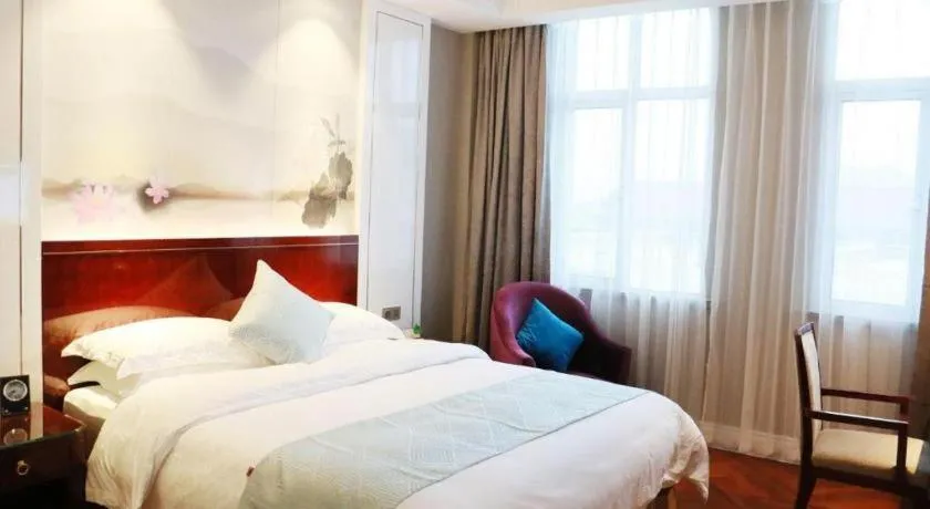 Bed in GreenTree Eastern Yancheng Binhai County Aobaolia Beichen Hotel