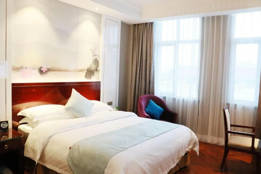 Bed in GreenTree Eastern Yancheng Binhai County Aobaolia Beichen Hotel