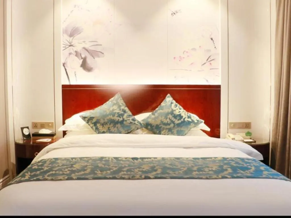 Bed in GreenTree Eastern Yancheng Binhai County Aobaolia Beichen Hotel