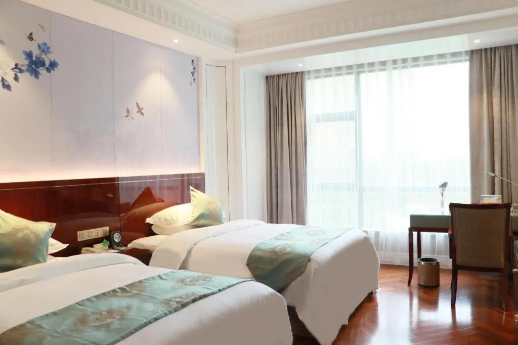 Bed in GreenTree Eastern Yancheng Binhai County Aobaolia Beichen Hotel
