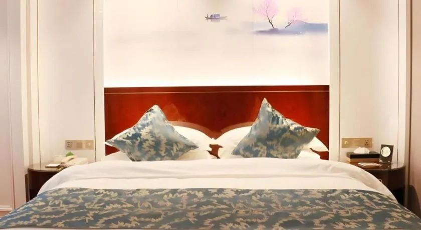 Bed in GreenTree Eastern Yancheng Binhai County Aobaolia Beichen Hotel