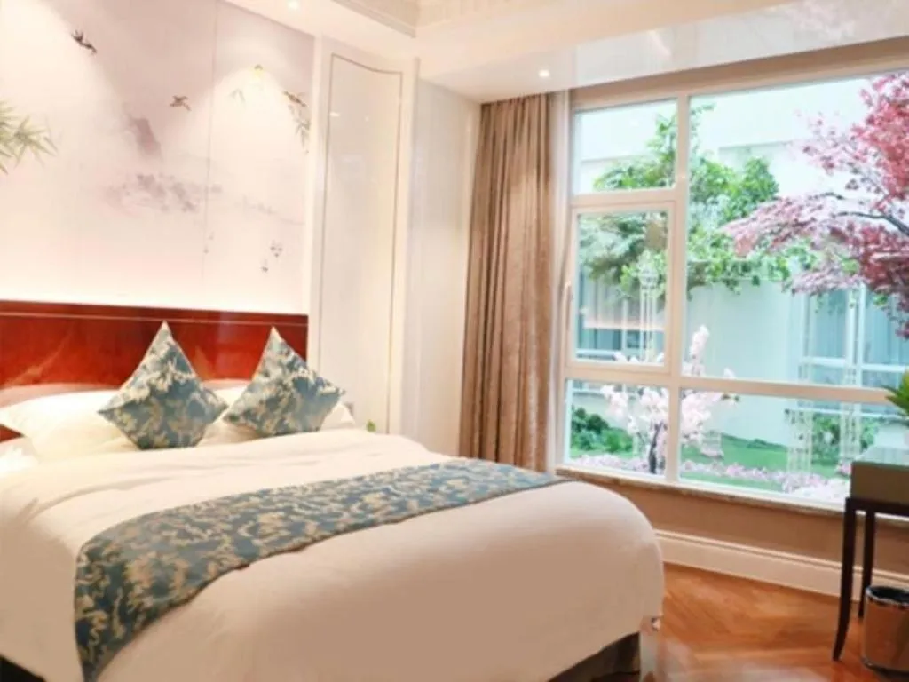 Bed in GreenTree Eastern Yancheng Binhai County Aobaolia Beichen Hotel