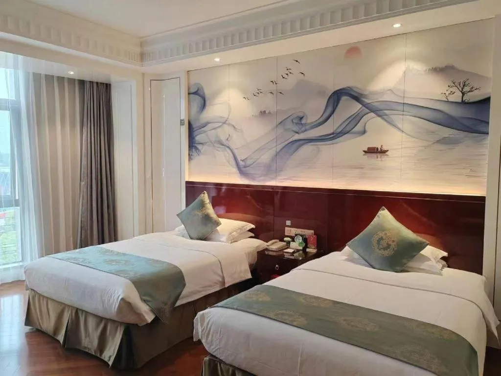Bed in GreenTree Eastern Yancheng Binhai County Aobaolia Beichen Hotel