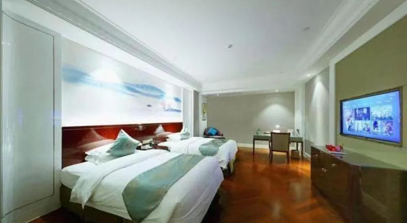 Bed in GreenTree Eastern Yancheng Binhai County Aobaolia Beichen Hotel