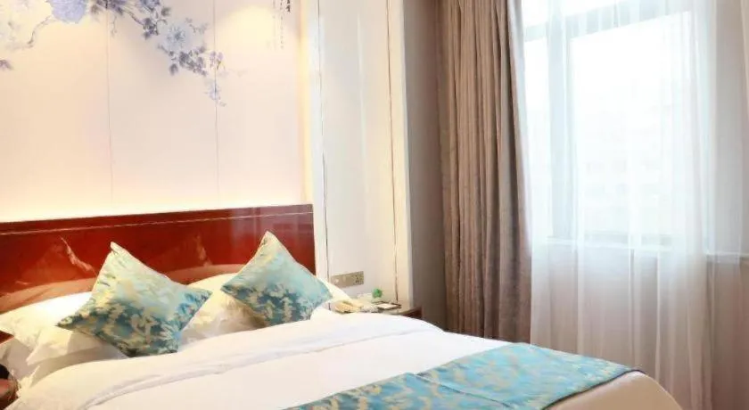 Bed in GreenTree Eastern Yancheng Binhai County Aobaolia Beichen Hotel