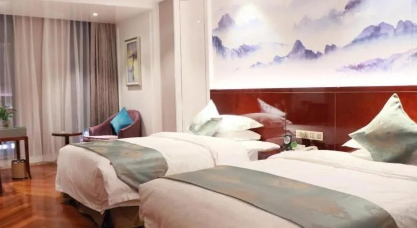 Bed in GreenTree Eastern Yancheng Binhai County Aobaolia Beichen Hotel