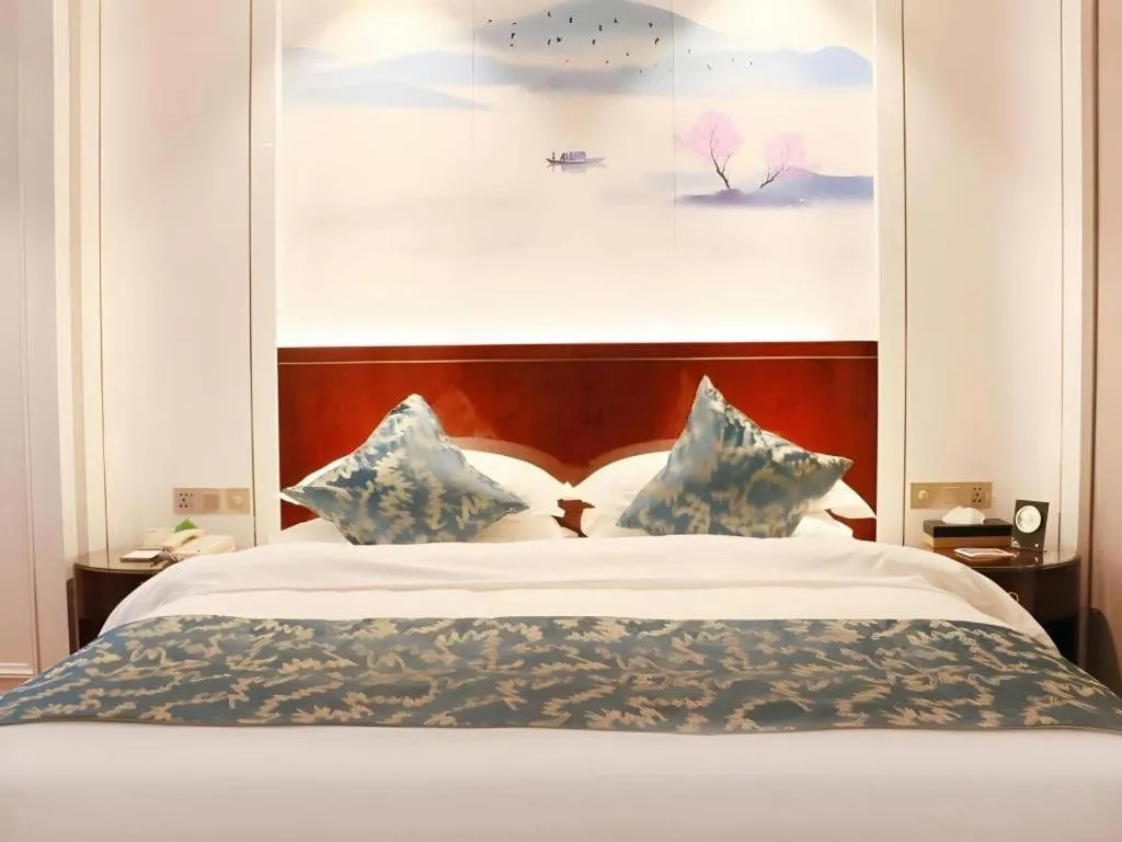 Bed in GreenTree Eastern Yancheng Binhai County Aobaolia Beichen Hotel