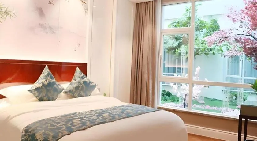 Bed in GreenTree Eastern Yancheng Binhai County Aobaolia Beichen Hotel