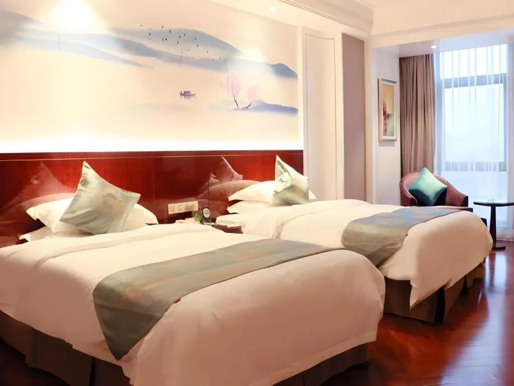 Bed in GreenTree Eastern Yancheng Binhai County Aobaolia Beichen Hotel