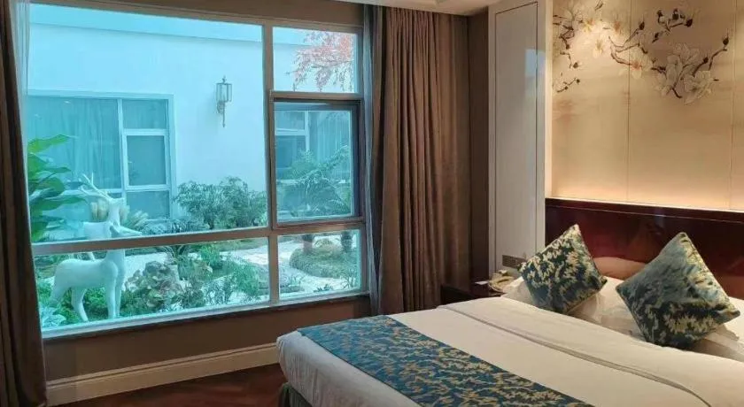 Bed in GreenTree Eastern Yancheng Binhai County Aobaolia Beichen Hotel