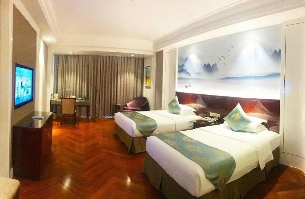 Bed in GreenTree Eastern Yancheng Binhai County Aobaolia Beichen Hotel