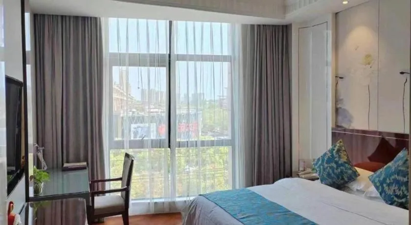 Bed in GreenTree Eastern Yancheng Binhai County Aobaolia Beichen Hotel