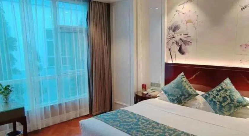 Bed in GreenTree Eastern Yancheng Binhai County Aobaolia Beichen Hotel