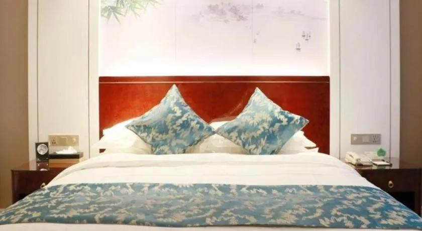 Bed in GreenTree Eastern Yancheng Binhai County Aobaolia Beichen Hotel