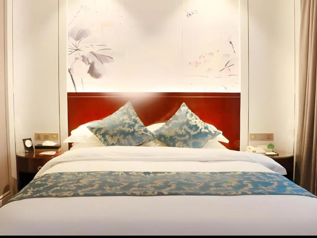 Bed in GreenTree Eastern Yancheng Binhai County Aobaolia Beichen Hotel