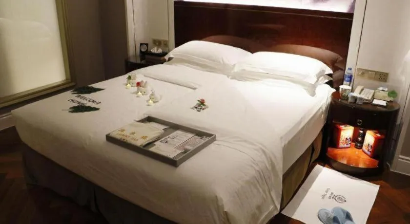 Bed in GreenTree Eastern Yancheng Binhai County Aobaolia Beichen Hotel